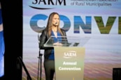 AITC-SK's Executive Director delivers a presentation at the SARM convention about the importance of agriculture education.